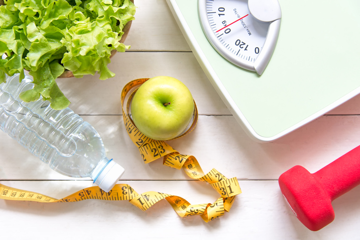 Nutrition and Weight Loss Goal, Scale, and Tape Measure